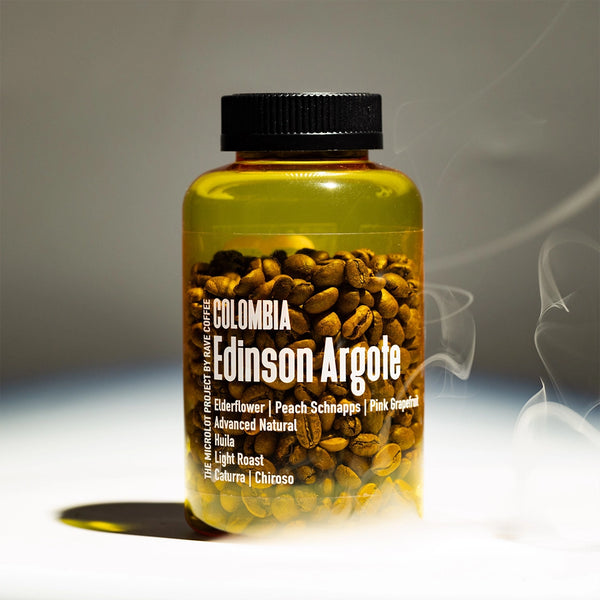 Jar of coffee beans with 'Colombia Edinson Argote' label on a gradient background