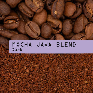 Close-up image shows coffee beans above and ground coffee below, divided by a purple label reading Mocha Java Blend Nº 3 in black—ideal for fans of bold coffee flavors.