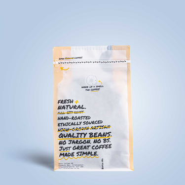 A photo of a RAVE branded coffee pouch, that showcases a Decaf coffee blend from the range.