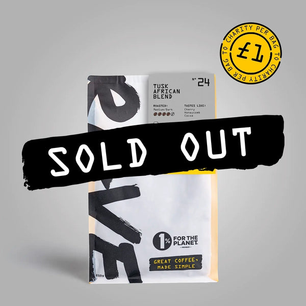 A SOLD OUT banner tops RAVE COFFEE’s Tusk African Blend Nº 24. This medium-dark roast uses Rwandan beans, donates £1 per bag to charity, and its packaging features a 1% for the Planet commitment.