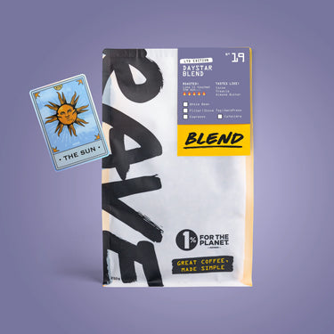 Coffee package with 'Blend' branding and a tarot card icon on a purple background