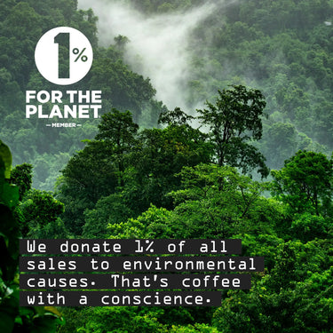 Misty green forest featuring the 1% For The Planet logo on a Coffee E-gift Card, representing a donation of 1% of sales to environmental causes for coffee with a conscience.