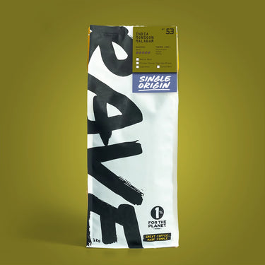 Coffee bag with branding and text on a yellow background