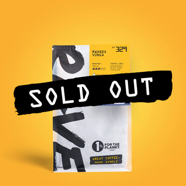 RAVE COFFEE’s Rwanda Vunga Nº 329 coffee bag, stamped with SOLD OUT in bold black text across the front, set against a vivid yellow background. This medium roast is sourced from the acclaimed Vunga washing station and features 1% for the Planet and “Great coffee, made simple.”.