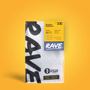 A bag of RAVE COFFEE Rwanda Bumbogo Nº 330 features tasting notes and icons on a yellow background, with text reading “1% for the Planet” and “Great coffee, made simple—a vibrant fruity coffee experience.”.