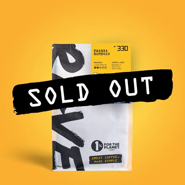 A bag of RAVE COFFEE's Rwanda Bumbogo Nº 330, noted for fruity notes, with bold black "SOLD OUT" text on a yellow background. The packaging features 1% For The Planet and "Great Coffee, Made Simple.