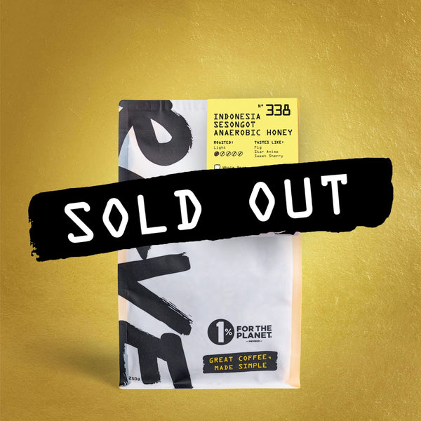A bag of RAVE COFFEE’s Indonesia Sesongot Anaerobic Honey Nº 338 stands out against a gold background with a bold SOLD OUT banner, featuring honey processing, 1% for the Planet, and “Great Coffee, Made Simple.”.