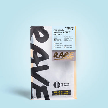 A bag of RAVE COFFEE labeled Colombia Danilo Pérez Gesha Nº 347 from Huila Colombia, with tropical fruit and toffee notes, 1% for the Planet, and Great coffee, made simple text on a light blue background.