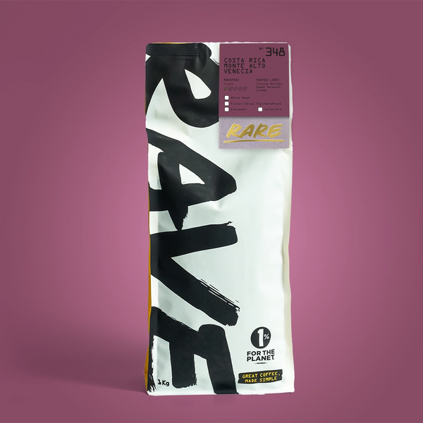 Coffee bag with 'Raw' branding on a purple background