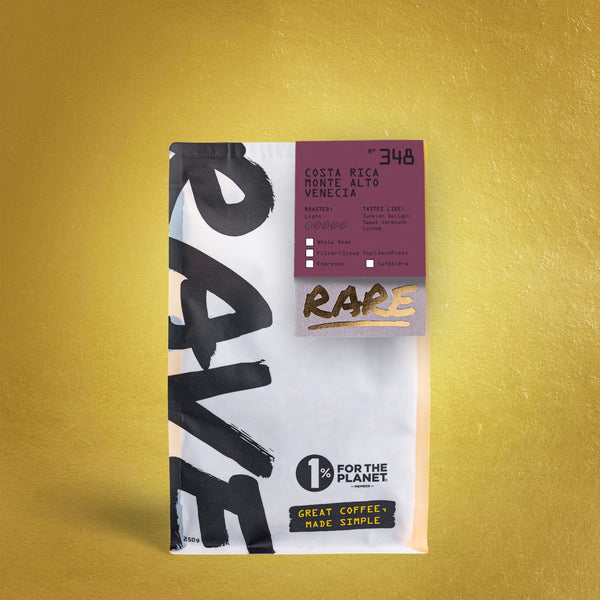 Rare Coffee package with 'RAVE' branding on a yellow background