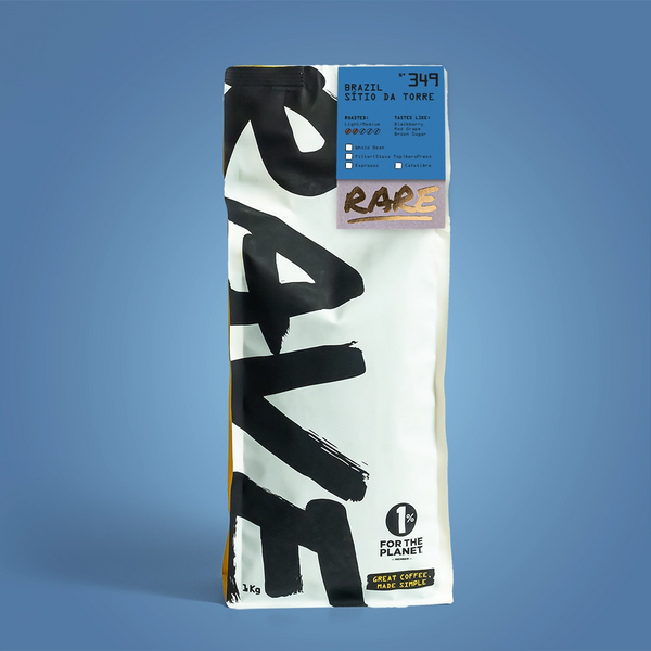 Coffee bag with 'RAVE' branding on a blue background