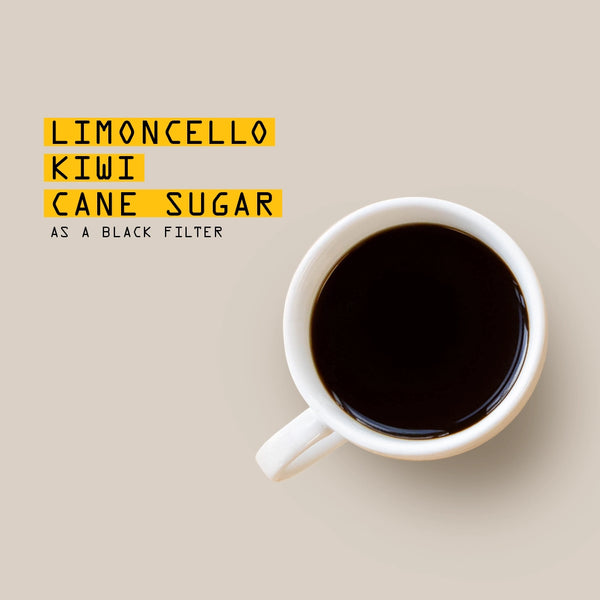 White mug with black coffee on a beige background, tasting notes overlay 'Limoncello, Kiwi, Cane Sugar as a Black Filter'.