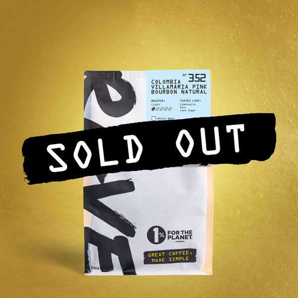 A bag of RAVE COFFEE’s Colombia Villamaria Pink Bourbon Natural Nº 352 rests on a yellow background, marked with a bold black SOLD OUT stripe—your chance at the perfect pour over, now gone.
