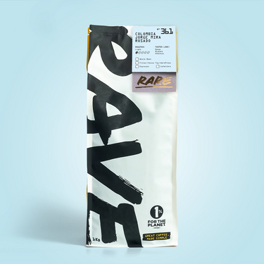 Coffee package with 'RAVE' branding on a light blue background
