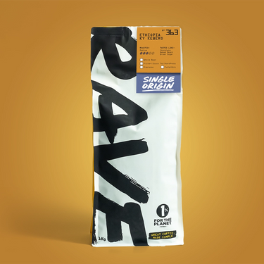 Coffee bag with 'Rave' branding on an orange background