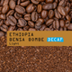 Coffee beans and ground coffee with 'Ethiopia Bensa Bombe Decaf' label.