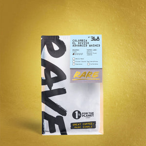 Bag of Rave Branded, Colombian coffee on gold foiled background.