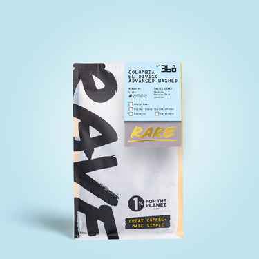 A 1kg bag of 360 Coffee Colombia Fair Trade Washed Medium Roast, featuring a white and black design with a gold accent stripe and a 'RARE' label, set against a light blue background.
