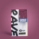 A package of One Coffee single-origin Costa Rica Las Lajas coffee, standing upright against a solid mauve background. The bag is white with bold black brushstrokes, a dark purple label, and a blue 'Single Origin' badge.