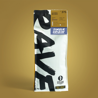 A 1kg bag of Single Origin Uganda Rwego whole bean coffee, featuring a white bag with bold black brushstrokes, a gold top label, and a blue 'Single Origin' logo, set against a solid gold background.