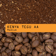 A close-up product graphic showing roasted coffee beans at the bottom, ground coffee at the top, and an orange label across the center reading 'KENYA TEGU AA Medium'.