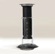The Aerobie AeroPress Premium Coffee Maker, in black and clear plastic, stands upright on a neutral background. Its cylinder shows 2–4 measurement markings and features innovative 3-in-1 brew technology.