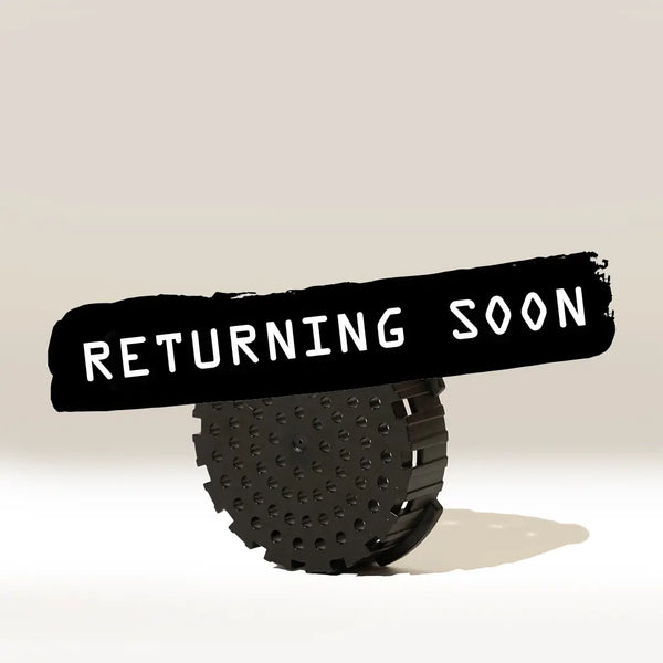 A dark AeroPress Replacement Filter Cap by Aeropress casts a shadow on a white surface. A black banner across the top reads "RETURNING SOON" in white text.