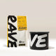 A Branded Airscape with Coffee from Rave stands upright next to a black mug featuring 