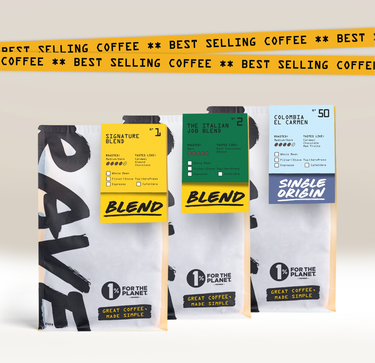 Coffee packages with various labels and branding on a light background