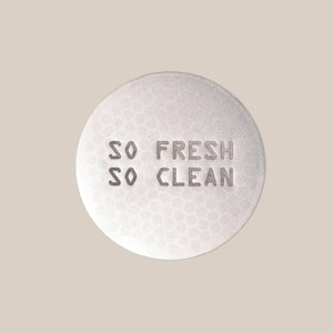 Round silver puck screen with 'So Fresh So Clean' text on a beige background