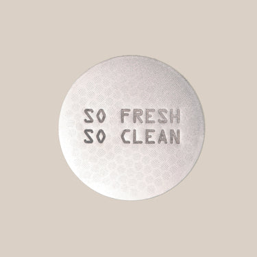 Round silver puck screen with 'So Fresh So Clean' text on a beige background