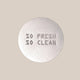 Round silver puck screen with 'So Fresh So Clean' text on a beige background