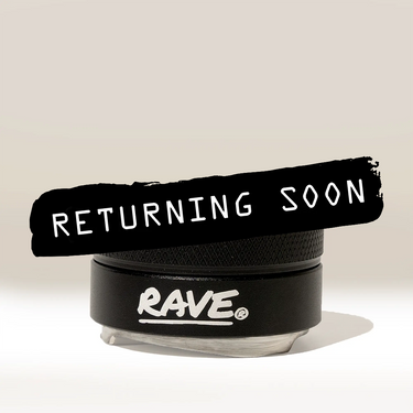 A black container labeled RAVE Coffee features a bold black brushstroke overlay with “RETURNING SOON” in white text, set against a plain beige background—ideal for those seeking consistent extraction using the Rave 54mm Espresso Distributor.
