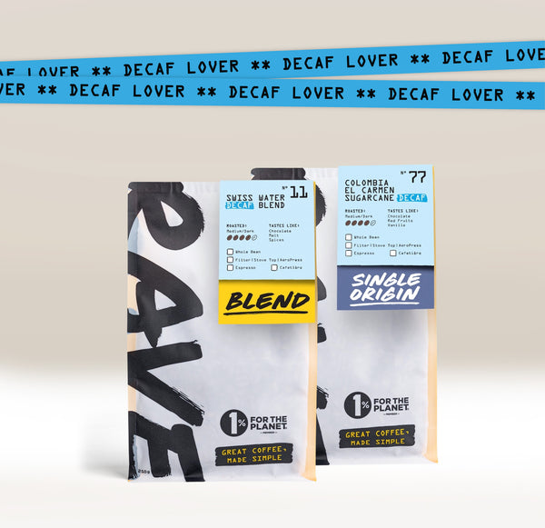 The Decaf Lover Coffee Bundle by Ravecoffee features two bags—Blend and Single Origin—labeled “DECAF LOVER,” both mycotoxin tested, swiss water decaf, and displaying "1% for the Planet" and "Great Coffee Made Simple.