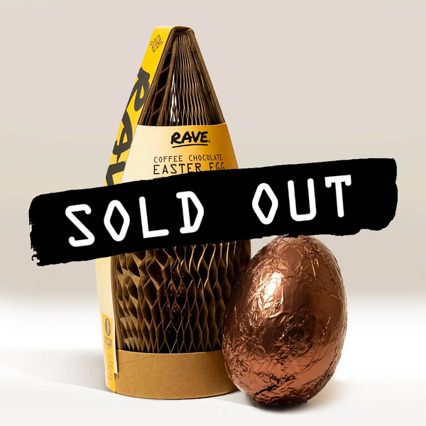 A RAVE COFFEE Coffee Chocolate Easter Egg with caramelised hazelnuts in packaging is beside a foil-wrapped egg, with a bold black SOLD OUT banner across the image.