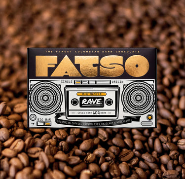 RAVE X FATSO chocolate bar packaging featuring a retro boombox illustration resting on a bed of roasted Colombian coffee beans and caramelised hazelnuts.