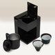 The Fellow Aiden Precision Drip Filter Coffee Maker by Fellow, shown in black with its lid open beside a matching carafe and two filter baskets, offers customizable temperature controls for the perfect brew, all arranged on a light background.
