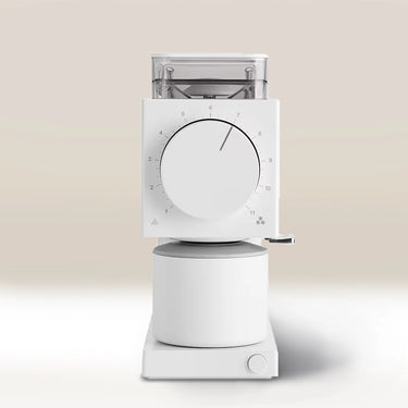 The Fellow Ode Brew Grinder Gen 2 by Fellow features Gen 2 Brew Burrs, a numbered dial, transparent top bean hopper, and cylindrical grounds container, all in modern white, set against a neutral background.