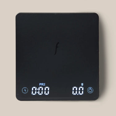 A black Flair Brew Scale by Flair, featuring a central 