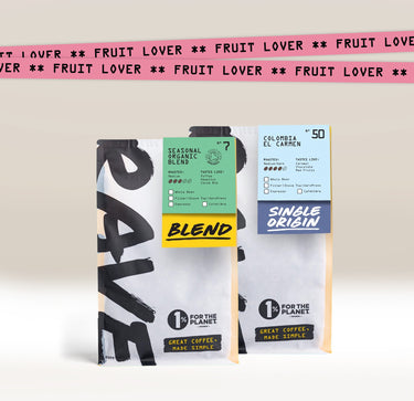 Two coffee bags with branding and text on a light background