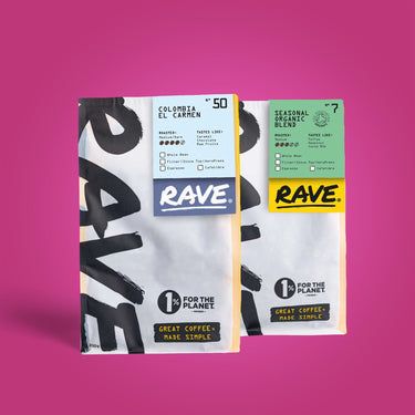 Two vibrant Ravecoffee Fruit Lover Coffee Bundle bags stand against a pink background, featuring details on fruity coffees, roast level, tasting notes, plus 1% for the Planet and Great Coffee. Made Simple at the bottom.