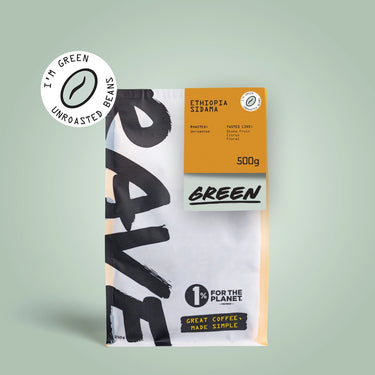 A 500g bag of RAVE COFFEE Ethiopia Sidamo Green Coffee Beans for home roasting, with bold black and yellow branding and a pale green label showing 1% For The Planet and Great Coffee Made Simple.