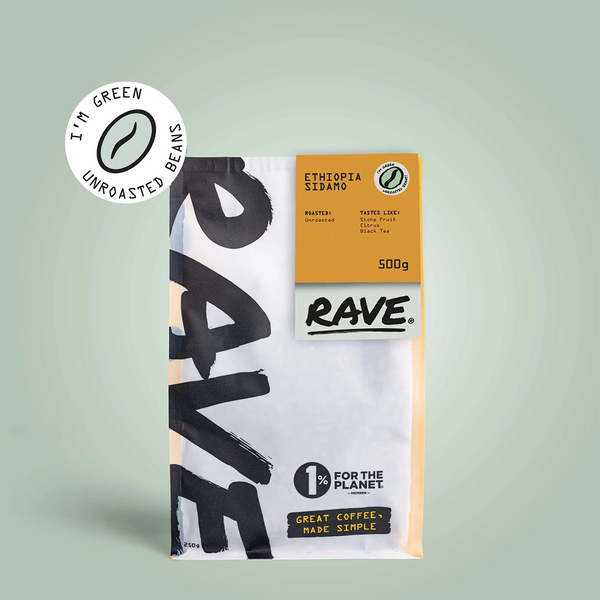 A 500g bag of RAVE COFFEE Ethiopia Sidamo Green Coffee Beans for home roasting, with bold black and yellow branding and a pale green label showing 1% For The Planet and Great Coffee Made Simple.