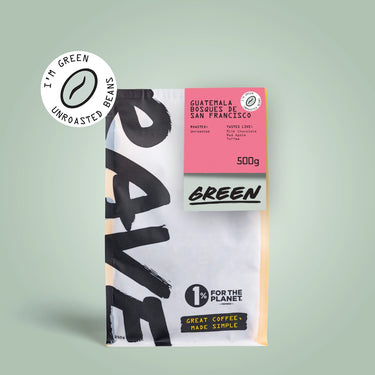 A 500g bag of Guatemala Bosques de San Francisco Green Coffee Beans from RAVE COFFEE features pastel packaging, bold text, a 1% for the Planet badge, and an 