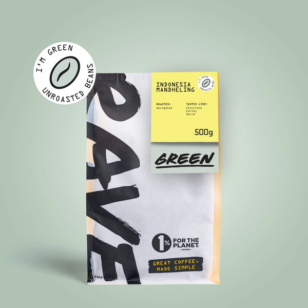 A 500g bag of RAVE COFFEE’s Indonesia Mandheling Green Coffee Beans features cocoa, caramel, and spice notes. Ideal for home roasting, it boasts “I’m Green” unroasted beans and 1% for the Planet on a light green background.