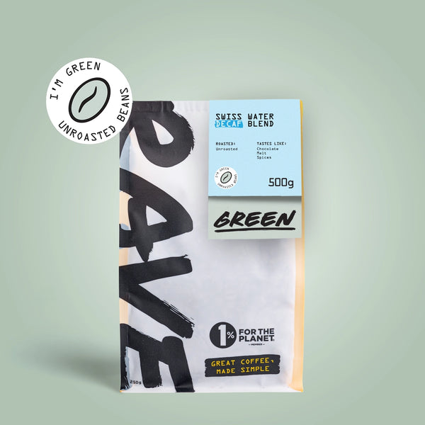 A 500g bag of coffee beans from the brand '1 FOR THE PLANET' with a 'SWISS WATER BLEND' label. The bag is white with large black brush-stroke lettering and a light blue label.