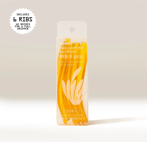 A clear package labeled “Hario Suiren Ribs (set of 6)” contains six yellow ribs. A round label reads: “Includes 6 ribs; 12 required for a full Hario V60 Suiren dripper.”.