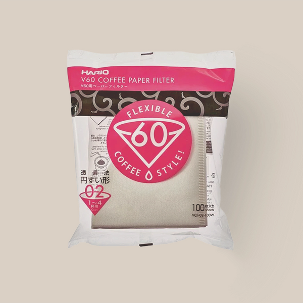 The Hario Filter Papers V60 02 Dripper (100 Sheets) by Hario features a red Flexible 60 Coffee Style logo and includes 100 natural-colored pour-over coffee filters.