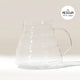 A Hario V60 Glass Coffee Server, made from heat-proof glass with a handle and measurement lines, sits on a white surface. In the top right corner, black text in a starburst reads 02 MEDIUM (2-3 cups)—perfect for V60 drippers.