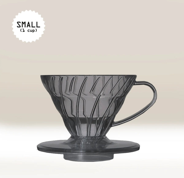 A Hario V60 Black Plastic Coffee Dripper with handle, crafted for one-cup filter coffee brewing, is set against a light beige background. "SMALL (1 cup)" appears in a white starburst at the top left corner.